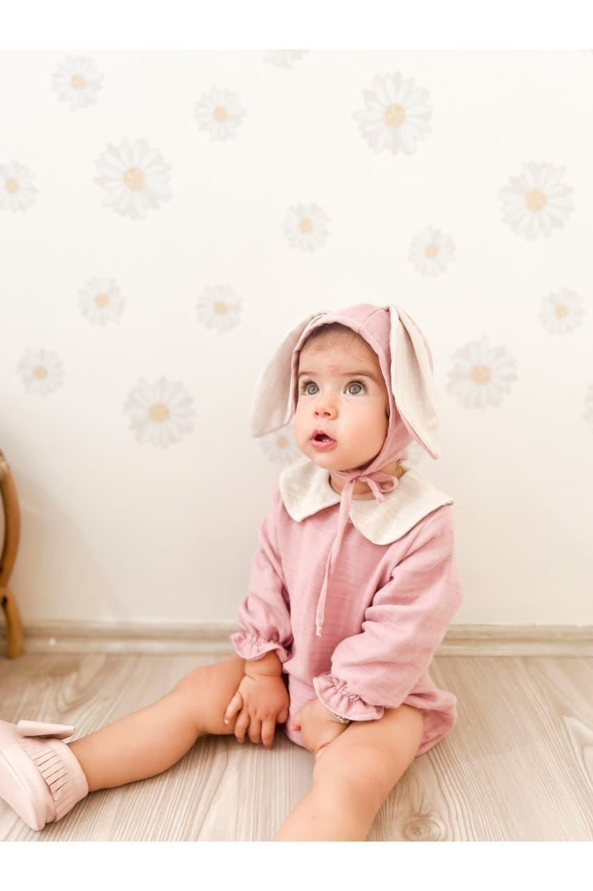 Soft pink beanie with adorable bunny ears, perfect for babies and toddlers