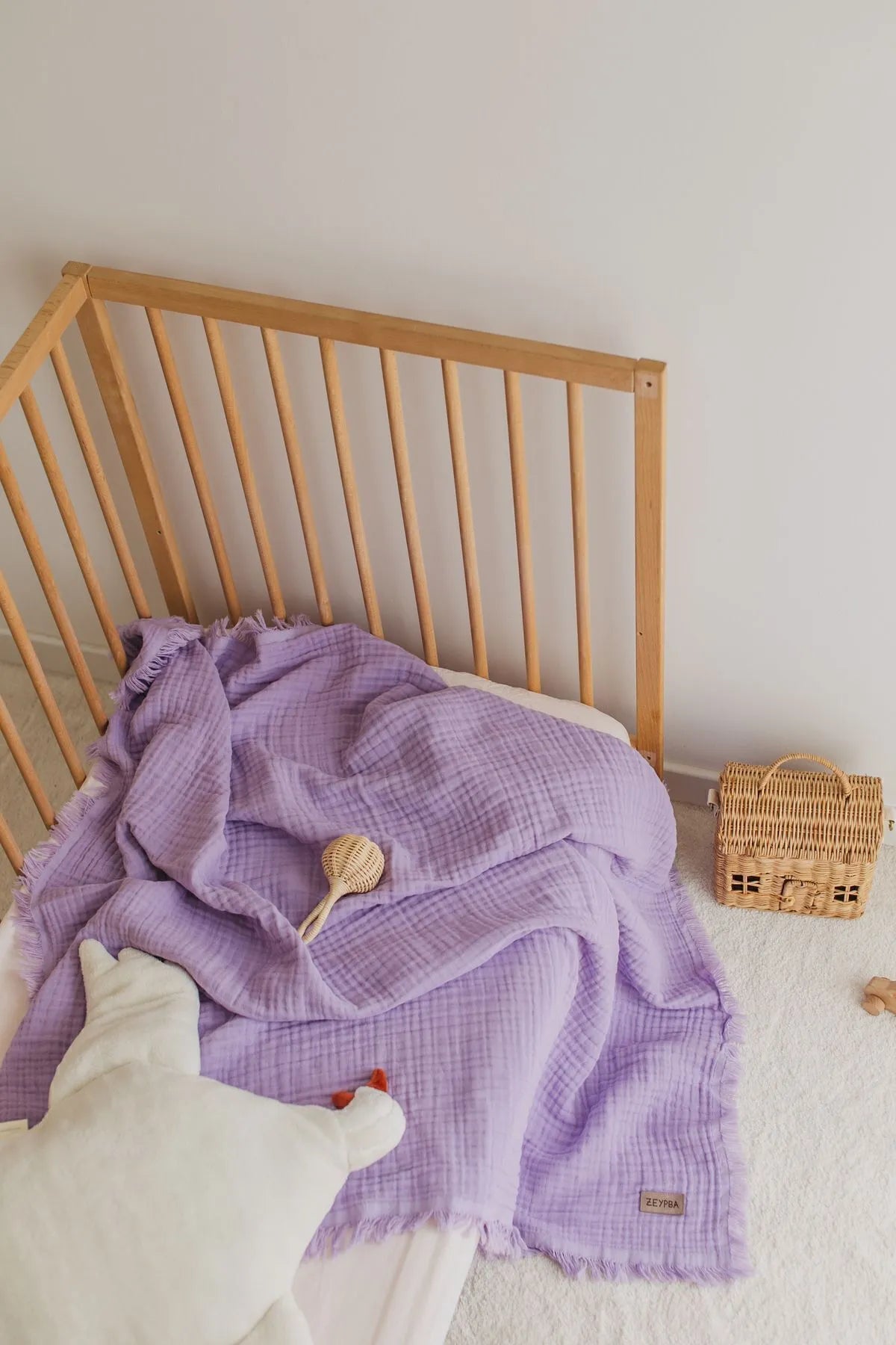 Cozy and comforting purple muslin blanket for babies and toddlers