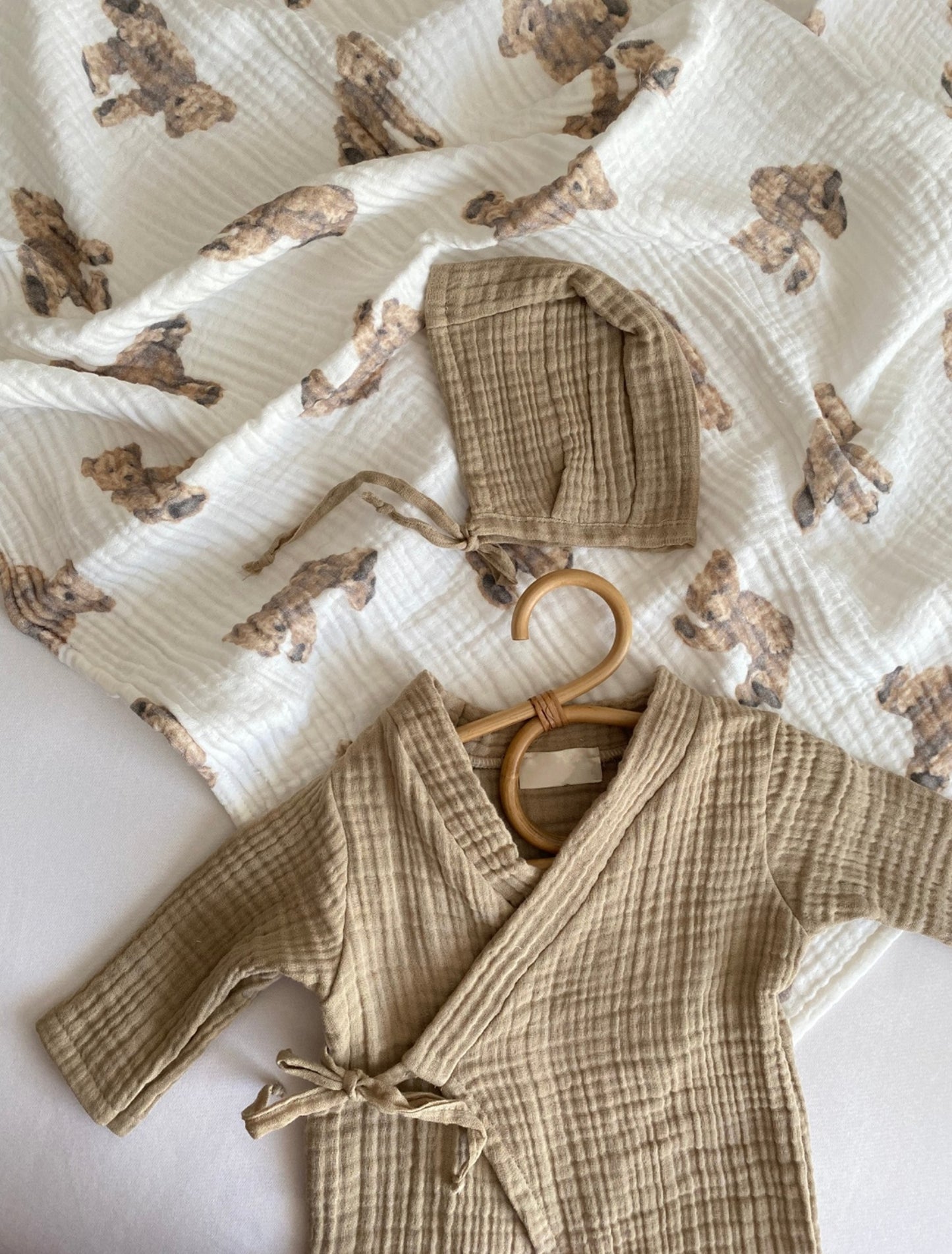 Soft and cozy baby kimono in a warm cocoa shade, perfect for lounging or dressing up