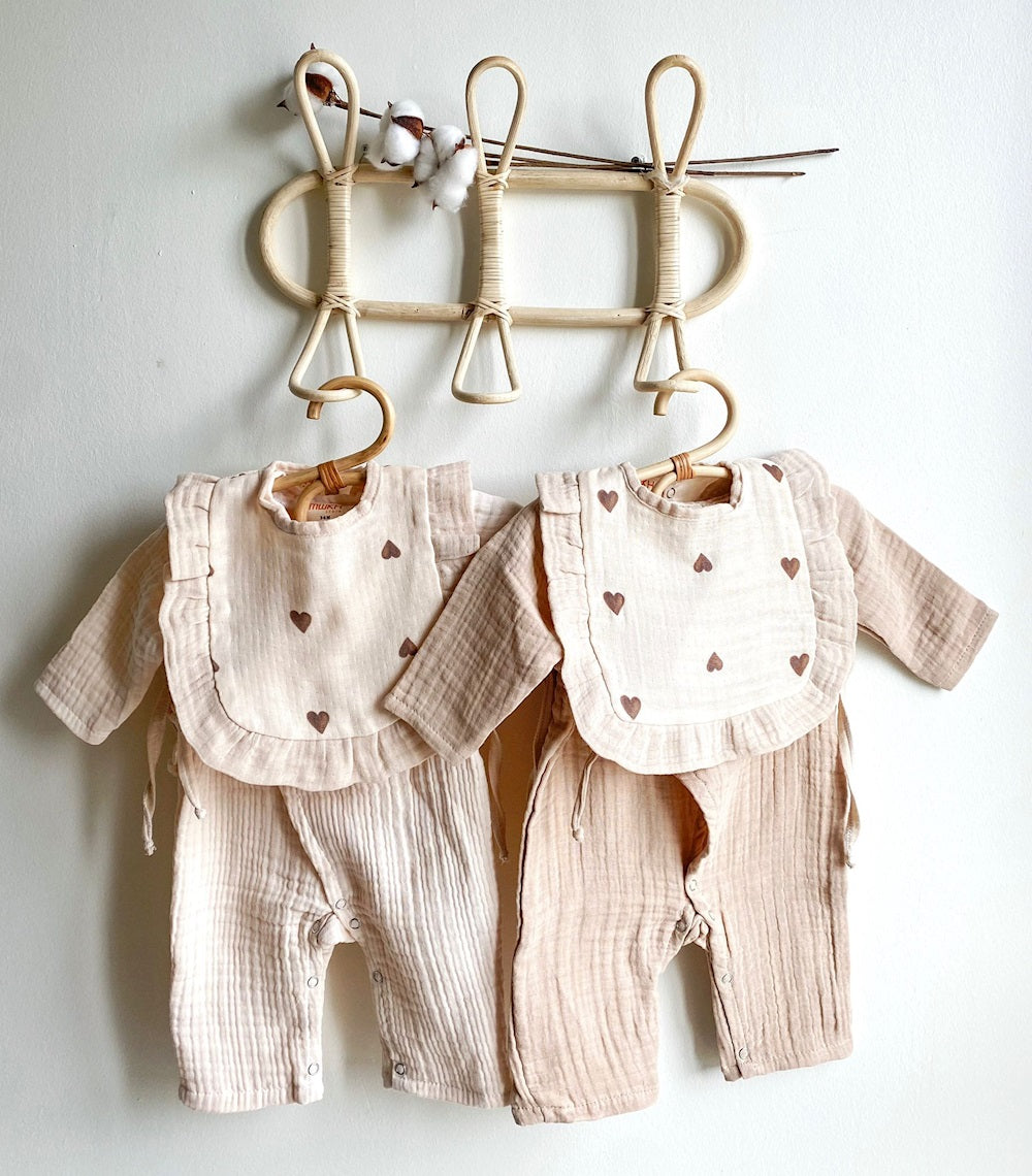 Adorable neutral-colored kimono set for babies, featuring heart embroidery and ruffles