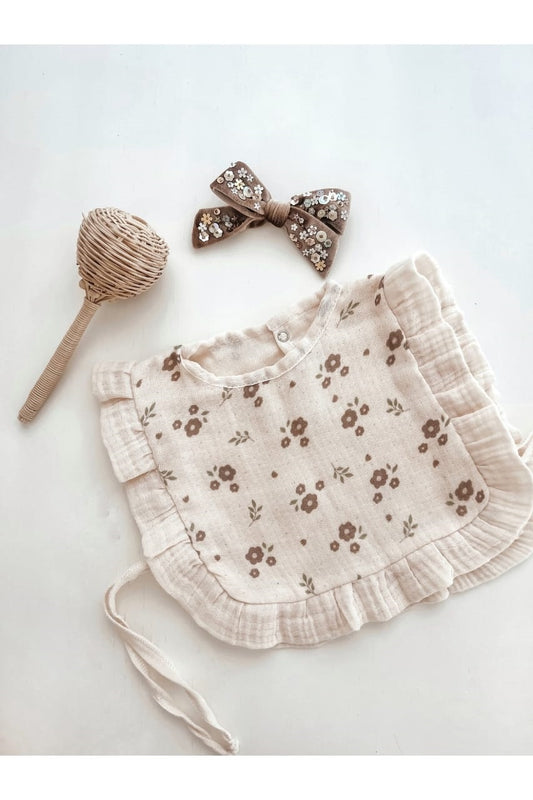 Adorable brown apron with flowers, ideal for messy play or arts and crafts