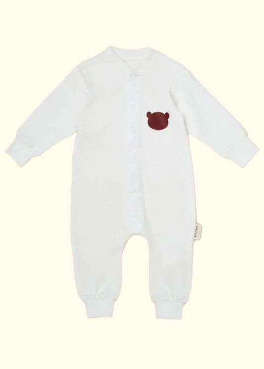 Cozy baby sleepsuit featuring a bear motif, ideal for bedtime