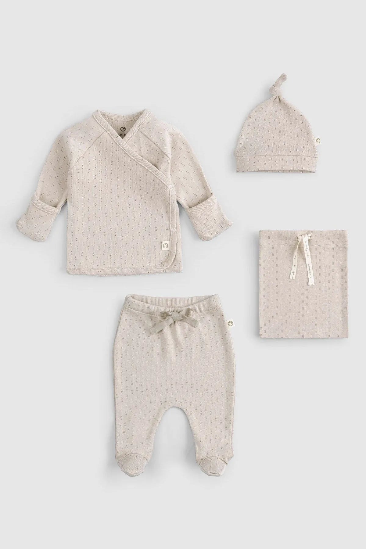 Eco-friendly oat beige newborn set made from organic materials