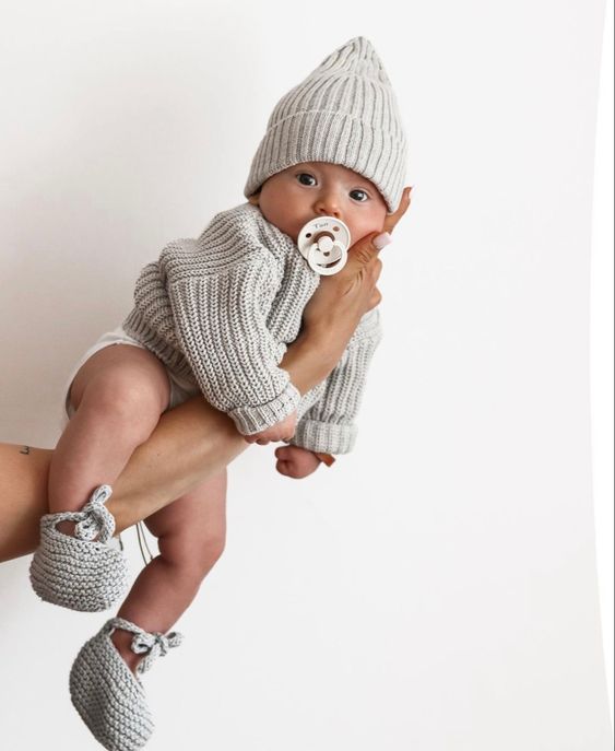 Charcoal gray baby sweater. Modern and stylish, made from soft, organic cotton. Keeps your little one warm and comfortable