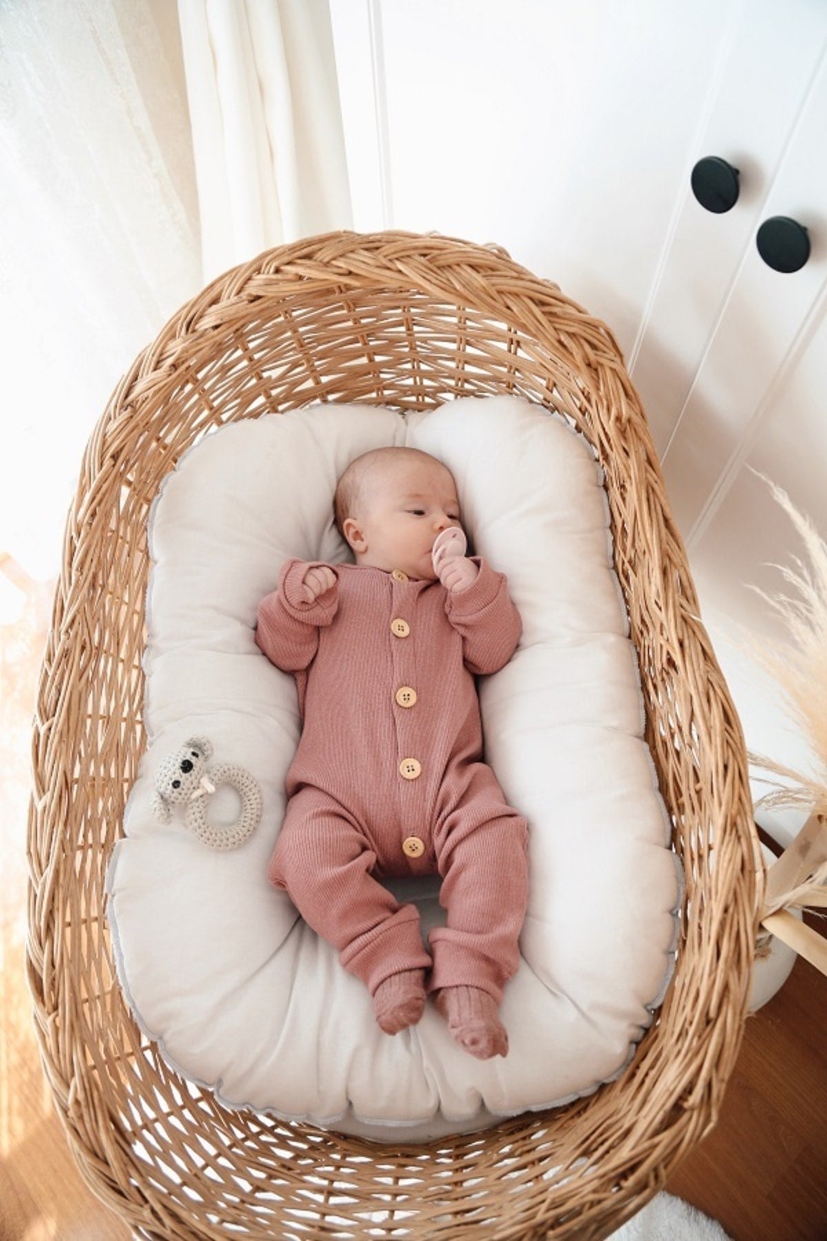 Sweet plum pink organic cotton sleepsuit. A gentle and calming color for a restful night