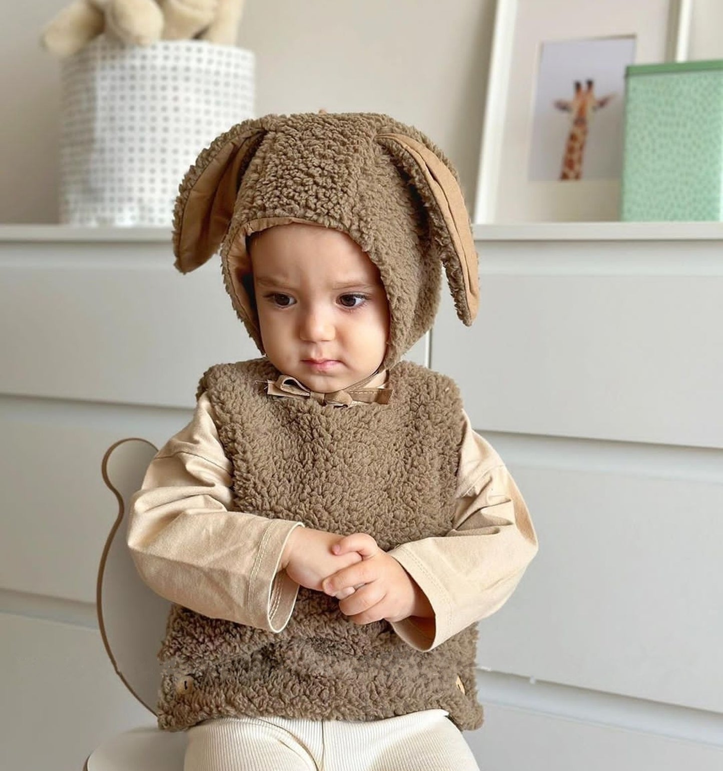 Plush brown beanie shaped like a teddy bear. Soft and cozy for winter wear